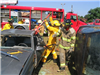 Firefighters Breaking Into the Vehicle