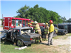 Firefighters Training on a Damaged Vehicle