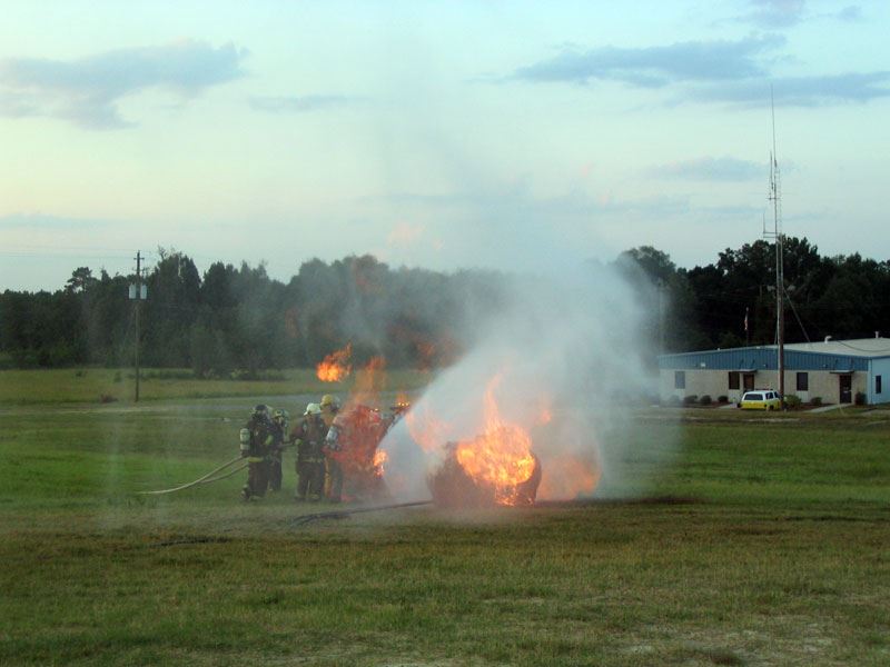 Firefighters Around the Fire
